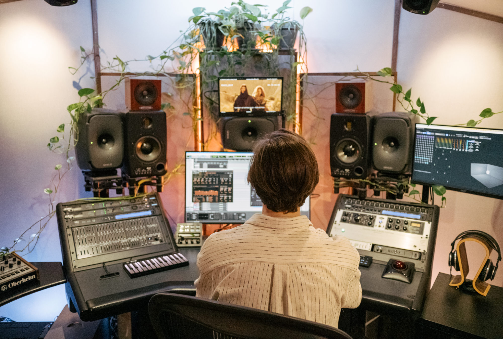 Gabriel Lundh sitting at desk in studio