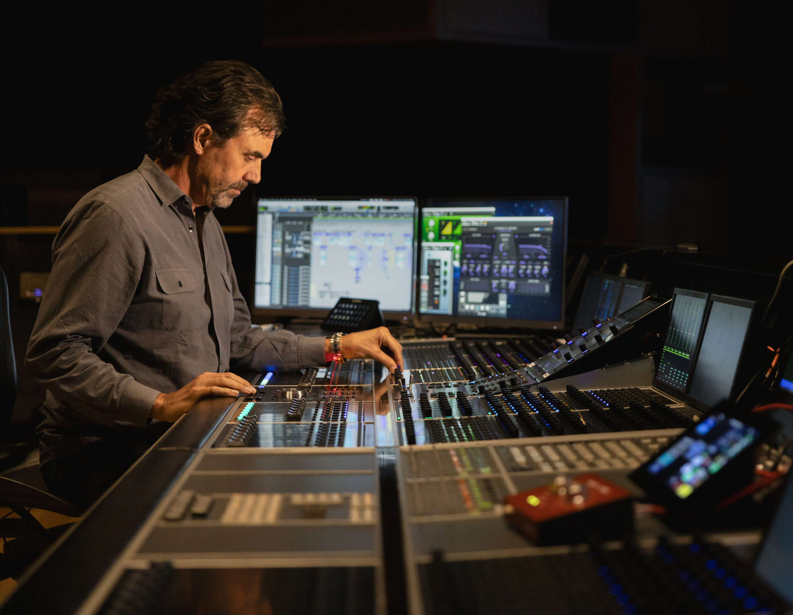 Re-recording mixer John W. Cook II at work