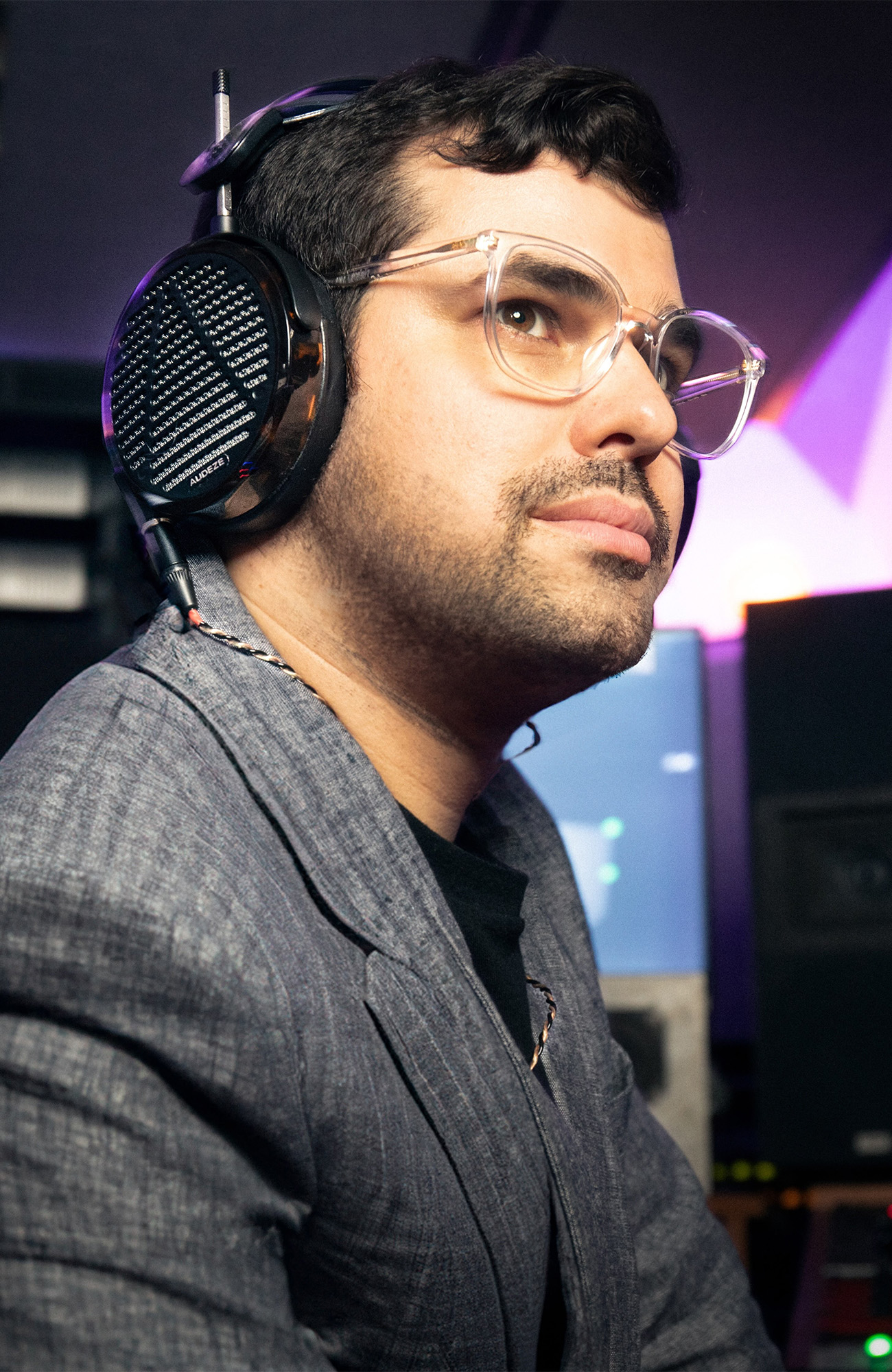 Immersive engineer Justin Gray wearing Audeze LCD-5 headphones