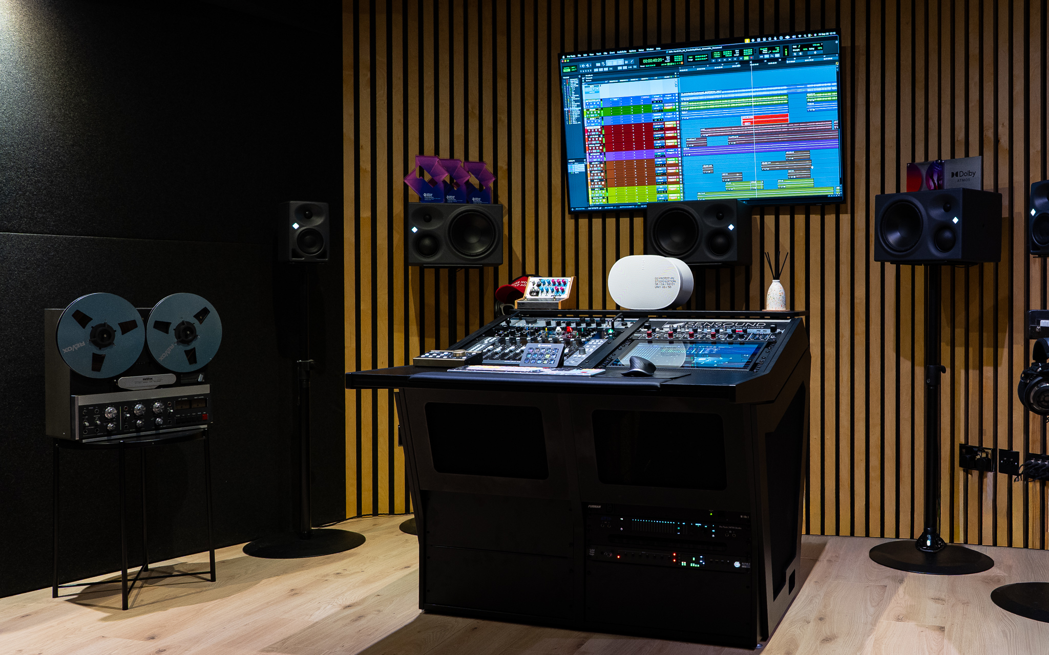 Mark Gittin's Atmos mix room at Sensound, featuring 9.1.4 monitoring, tape machine, and Sono Era 300 speaker.