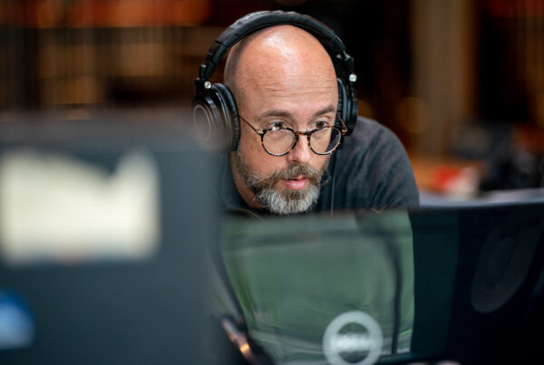 Grammy-winning engineer Hans-Martin Buff wearing headphones at Real World Studios.