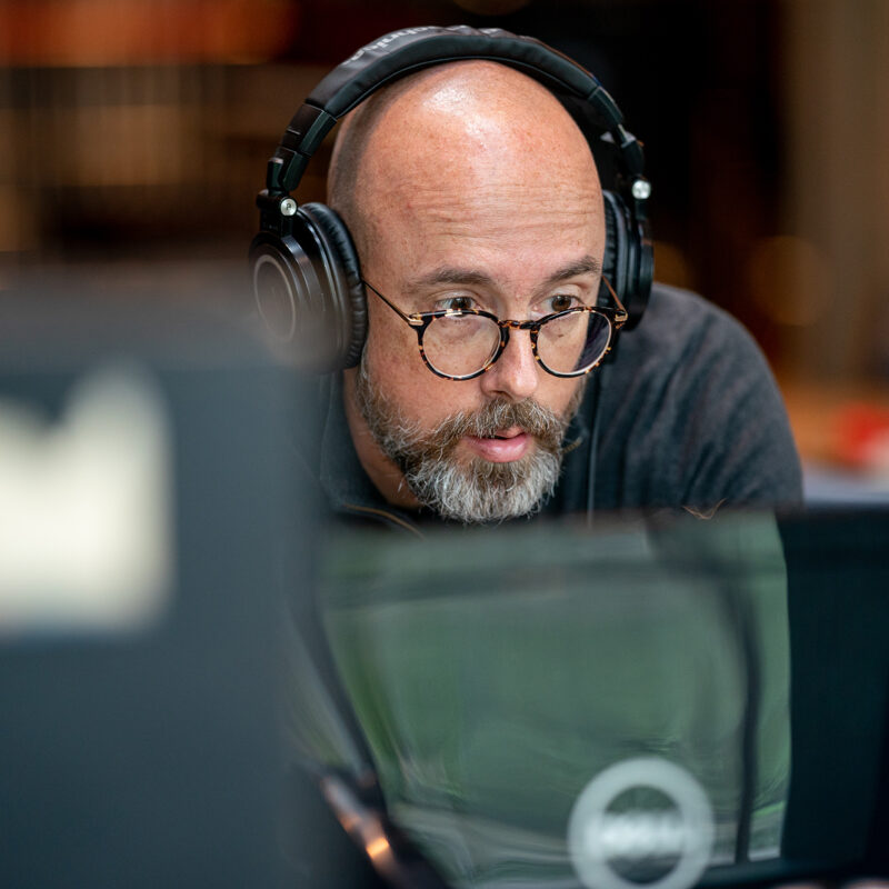 Grammy-winning engineer Hans-Martin Buff wearing headphones at Real World Studios.