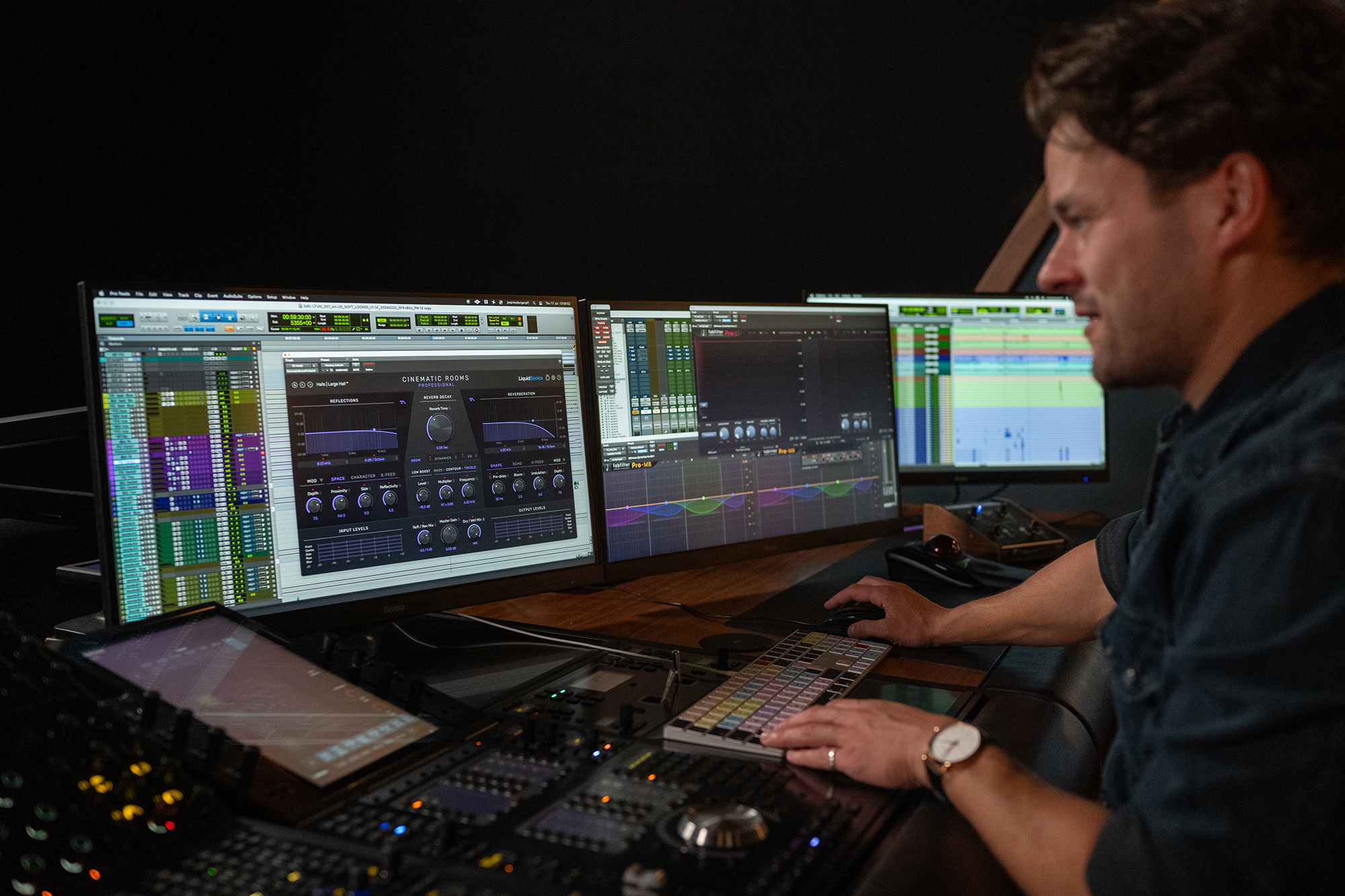 Pinewood's Jasper Thorn looking at the Cinematic Rooms Professional reverb plugin on screen at the Pressburger Theatre.